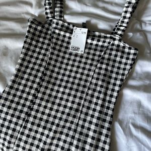 Black and white square mini dress. New with tags. Never been worn.